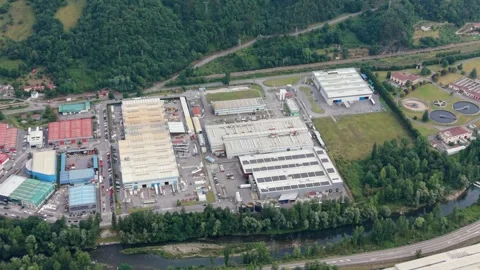 Aerial view of industry zone and water purification infrastructure in Asturias Stock Footage 340566137