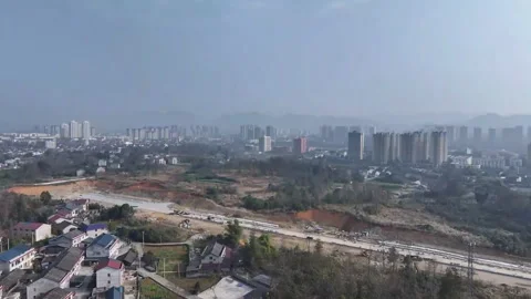 Aerial view of infrastructure construction and residential buildings in a de Stock Footage 325207454