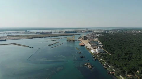 Aerial view of a infrastructure of a seaport, with various industries. Stock Footage 137223213