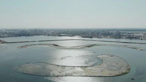 Aerial view of a infrastructure of a seaport, with various industries. Stock Footage 137223233
