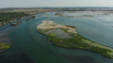 Aerial view of a infrastructure of a seaport, with various industries. Stock Footage 137223308