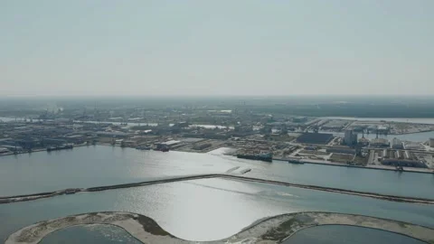 Aerial view of a infrastructure of a seaport, with various industries. Stock Footage 137223603