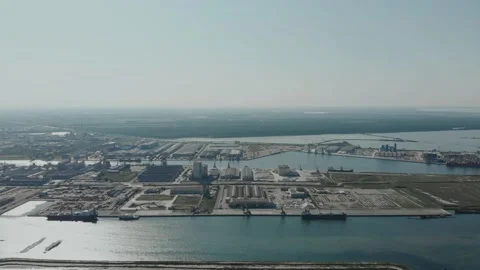 Aerial view of a infrastructure of a seaport, with various industries. Stock Footage 137223735