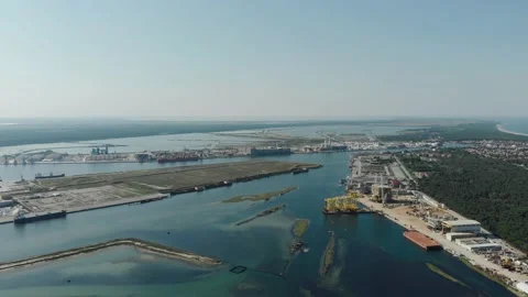 Aerial view of a infrastructure of a seaport, with various industries. Stock Footage 137223794