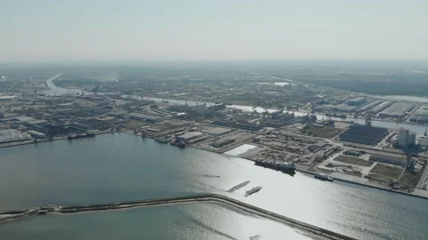 Aerial view of a infrastructure of a seaport, with various industries. Stock Footage 137223816