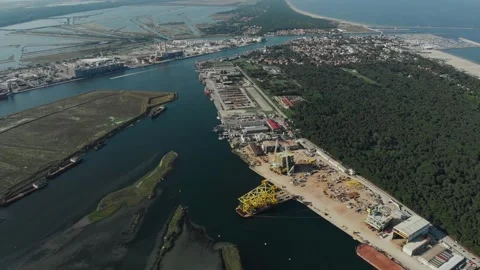 Aerial view of a infrastructure of a seaport, with various industries. Stock Footage 137224188