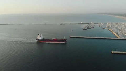 Aerial view of a infrastructure of a seaport, with various industries. Stock Footage 137224875