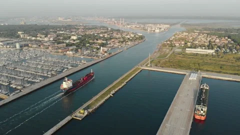 Aerial view of a infrastructure of a seaport, with various industries. Stock Footage 137225383
