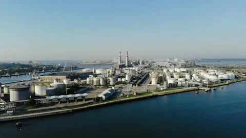 Aerial view of a infrastructure of a seaport, with various industries. Stock Footage 137225853