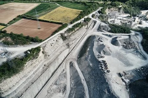 Aerial view of the inside of a deep stone quarry in Germany, Steinbruch Stock Photos