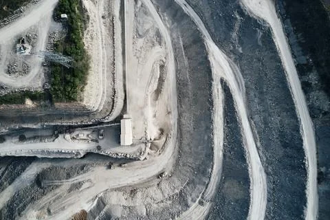 Aerial view of the inside of a deep stone quarry in Germany, Steinbruch Stock Photos