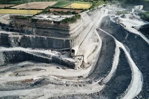 Aerial view of the inside of a deep stone quarry in Germany, Steinbruch Stock Photos