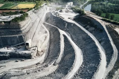 Aerial view of the inside of a deep stone quarry in Germany, Steinbruch Stock Photos