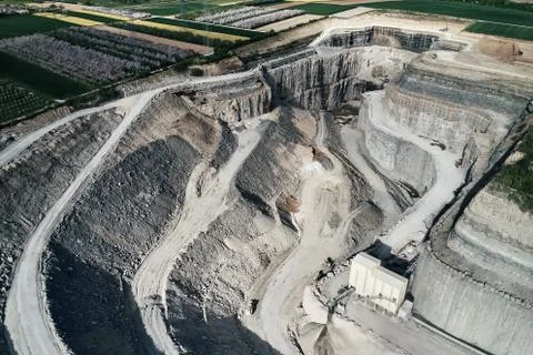 Aerial view of the inside of a deep stone quarry in Germany, Steinbruch Stock Photos