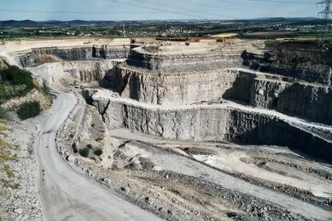 Aerial view of the inside of a deep stone quarry in Germany, Steinbruch Stock Photos