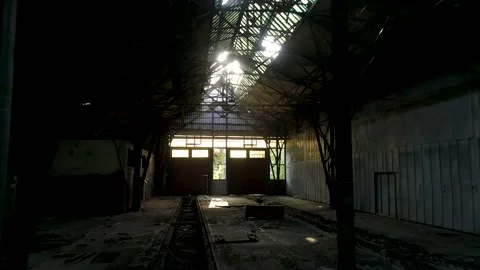 Aerial view inside of a scenic abandoned warehouse. Stock Footage 148987902