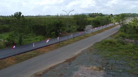 Aerial view of the installation of 5000 red and white flags in order to cel.. Stock Footage 247633329