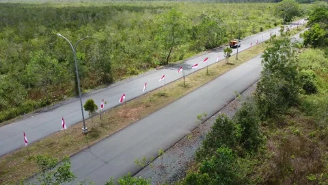 Aerial view of the installation of 5000 red and white flags in order to cel.. Stock Footage 247635222