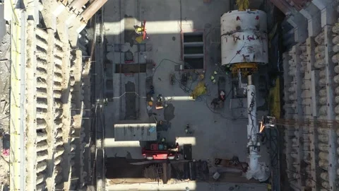 Aerial view of the installation work of a tunnel boring machine at a Stock Footage 279197324