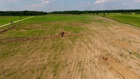 Aerial view of installing solar field pillars construction project. in country. Stock Footage 105174041