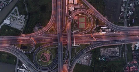 Aerial view interchange of a city over the highway at night Stock Footage 81738731