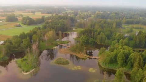 Aerial View of Interconnected Karst Lakes and Boardwalk in Biržai Regional Park, Stock Footage 321754636