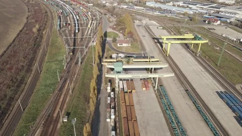 Aerial View of Intermodal Rail Terminal with Container Cranes Stock Footage 294666538