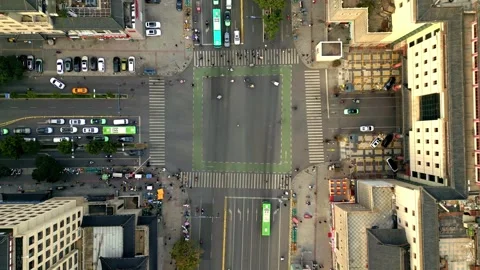 Aerial view of intersection with traffic, China. 스톡 동영상 327448864