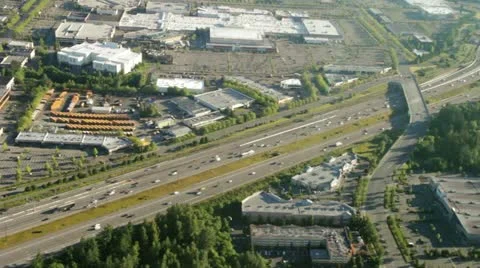 Aerial View of Interstate Approaching Large Highway Junction Stock Footage 11341073