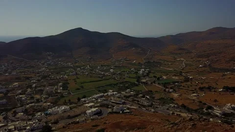 Aerial view of Ios harbor and surrounding typical Cycladic landscape Stock Footage 139746748