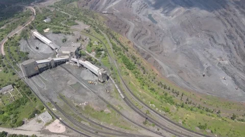 Aerial view of iron ore mining quarry with processing plant Stock Footage 320599878