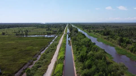 Aerial view of irrigation river flow, water inlet to flow water in agricult.. Stock Footage 315663818