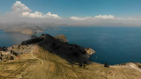 Aerial view of Isla del Sol (Island of the Sun) in Lake Titicaca, Bolivia Stock Footage 124511526