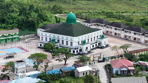 Aerial view of an Islamic boarding school with a large mosque inside Stock Footage 340642241