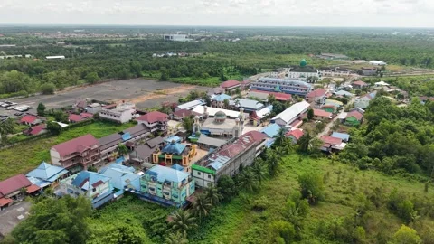 Aerial view of an Islamic boarding school with a large mosque inside Stock Footage 340642299