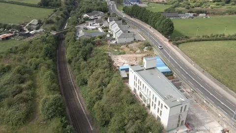 Aerial View of Islamic Centre and Railway and Road, Dalton-in-Furness, Cumbria Stock Footage 342413889