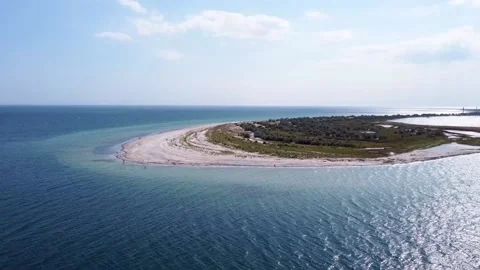 Aerial view of the island in the middle of the blue sea Stock Footage
