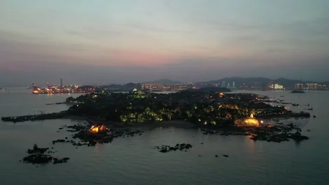 Aerial View of an Island Temple Complex at Dusk Vídeo Stock 345235328