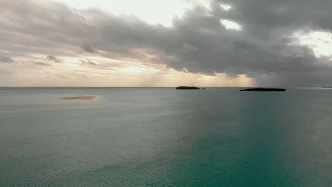 Aerial view isolate islands called motus in Aitutaki Lagoon Stock Footage 107753305