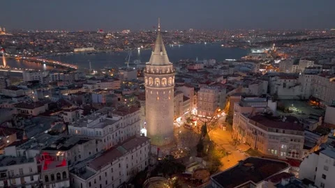 Aerial view of Istanbul at night, featuring the illuminated Galata Tower Stock Footage 343350861