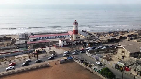 Aerial View of James Town Lighthouse Overlooking Atlantic Coast, Accra, Ghana Stock Footage 340572184