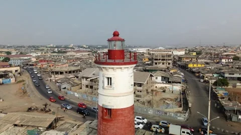 Aerial View of James Town Lighthouse Overlooking Atlantic Coast, Accra, Ghana Stock Footage 340572566