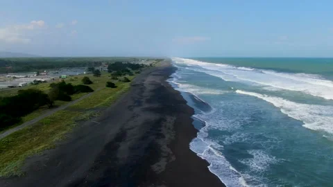 Aerial view of Jatimalang Beach on Java Indonesia washed by calm waves Stock Footage 149236829
