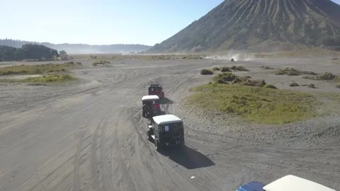 Aerial View of Jeep down the Bromo Sand Sea Video stock 205838227