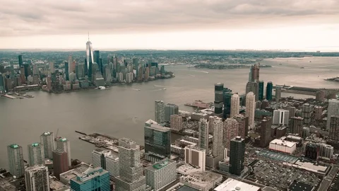 Aerial view of Jersey City and Downtown Manhattan from helicopter in slow Stock Footage
