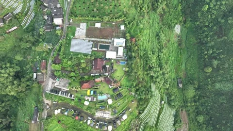 Aerial view of Joglo Java Neglasari and terraced fields, Indonesia. Stock-Footage 336333262
