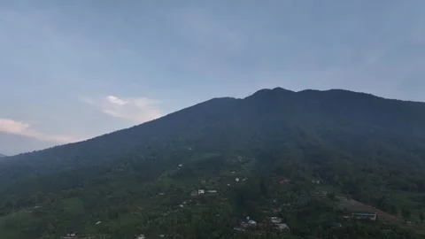 Aerial view of Joglo Java Neglasari and lush mountains, Indonesia. Stock-Footage 336333362