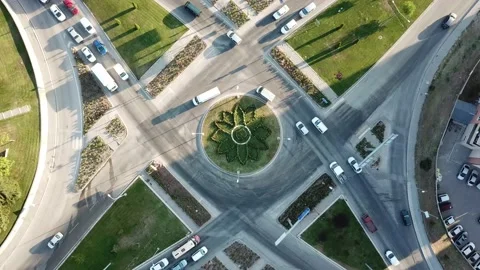 Aerial view of the junction road. There is a roundabout in the middle. Multi la Stock Footage 136297403