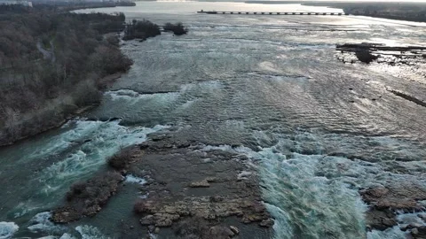 Aerial view of jungle and river during winter in Niagara Falls New York State Stock Footage 232393581