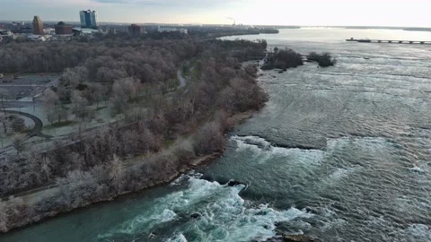 Aerial view of jungle and river during winter in Niagara Falls New York State Stock Footage 232393705